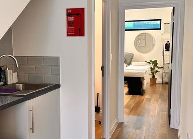 Inviting treatment room at Brows & Beauty by Vu, London, England, GB, featuring a calming ambiance and modern design.