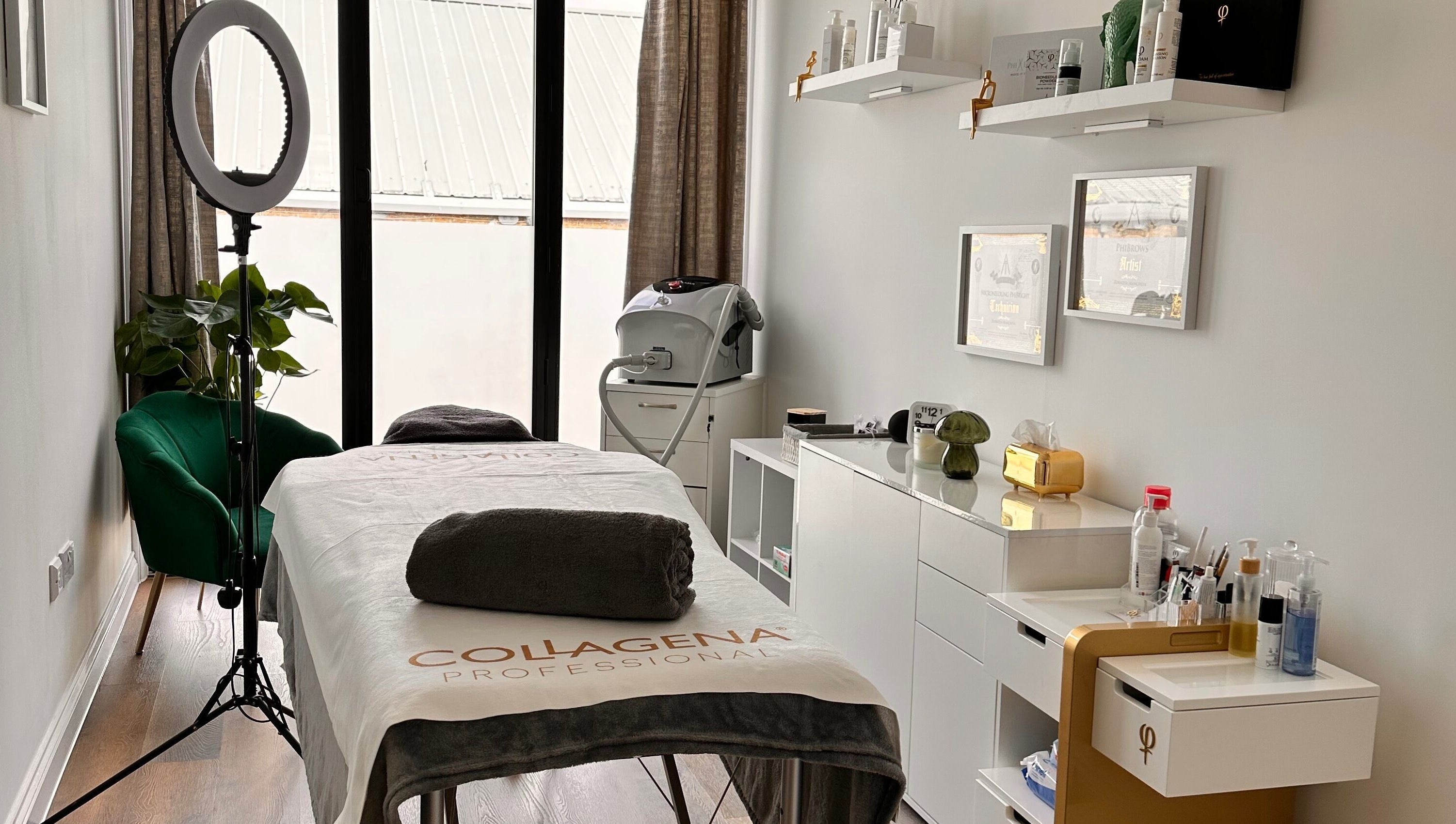 Relaxing treatment room at Brows & Beauty by Vu in London, England, GB, featuring elegant decor and advanced equipment.