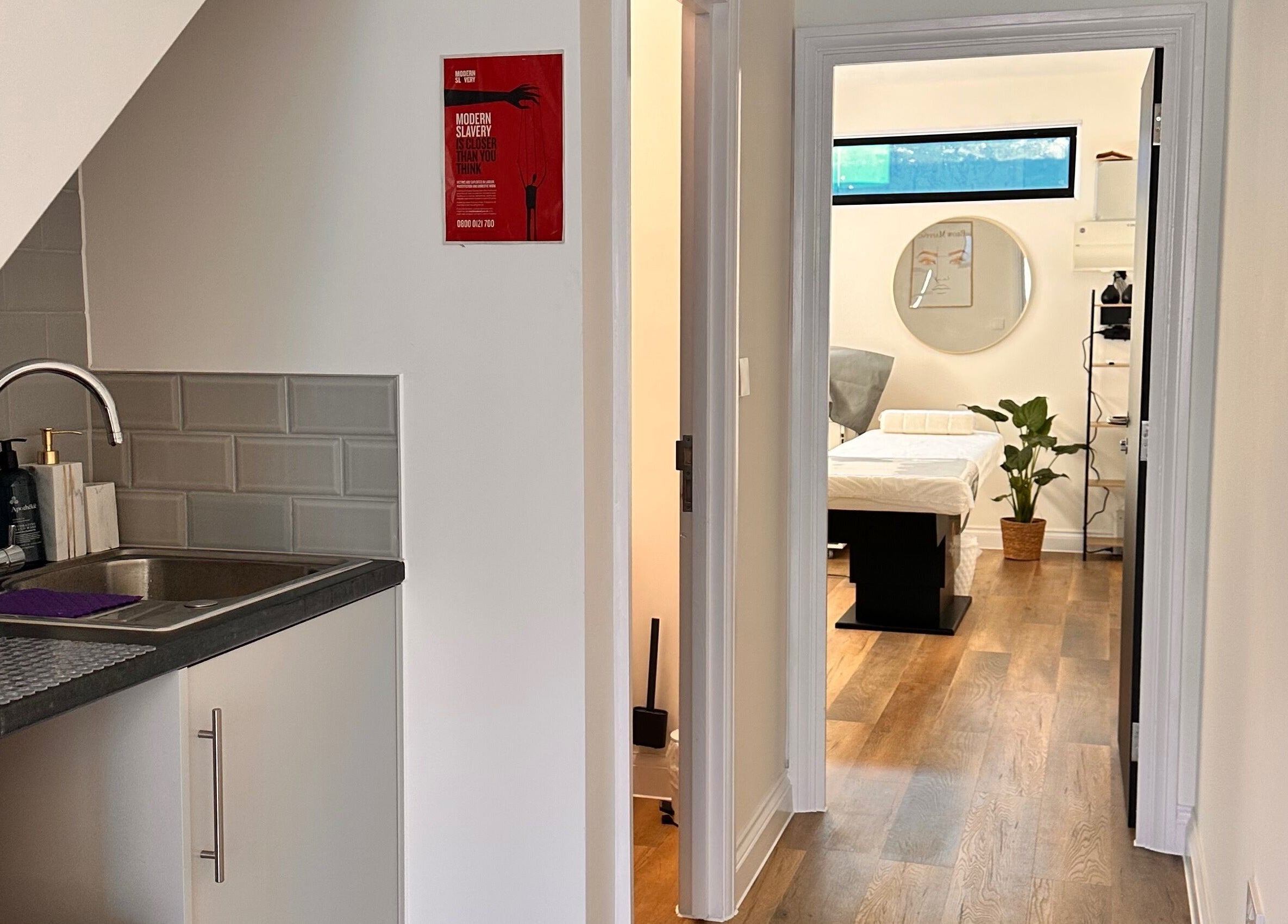 Bright treatment room at Brows & Beauty by Vu, London, England, GB with a cozy, inviting atmosphere.