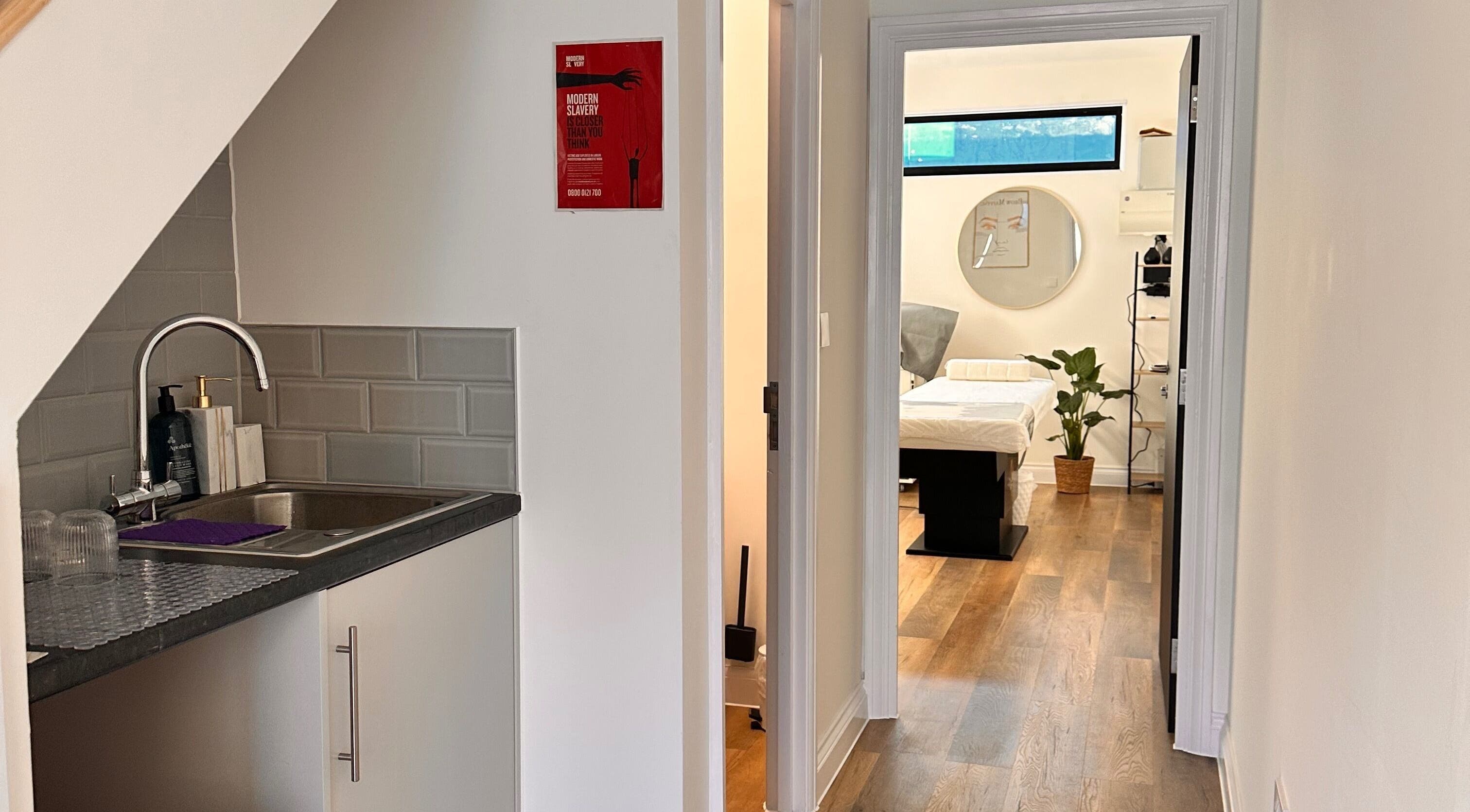 Bright treatment room at Brows & Beauty by Vu, London, England, GB with a cozy, inviting atmosphere.