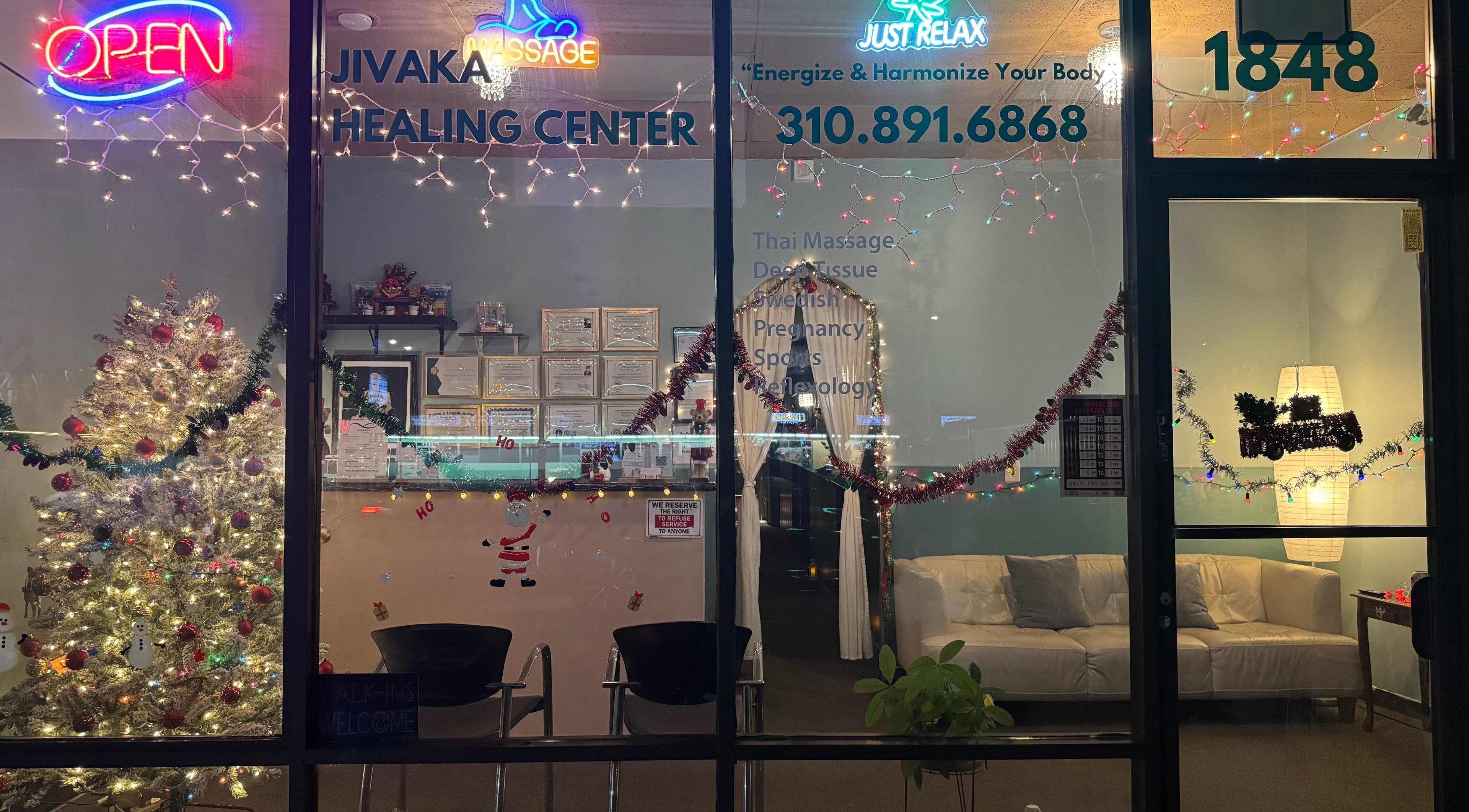 Jivaka Massage & Wellness festive exterior with holiday decorations in Lomita, California, US.