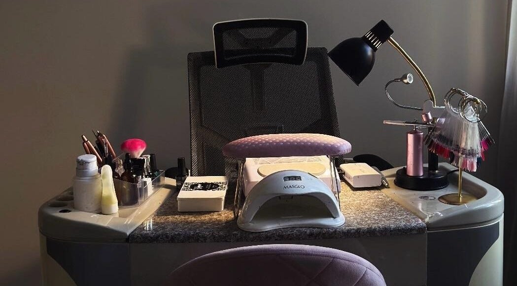 Modern nail station at Ampola Nail Studio, Melbourne, Victoria, AU, showcasing manicure tools and decor.