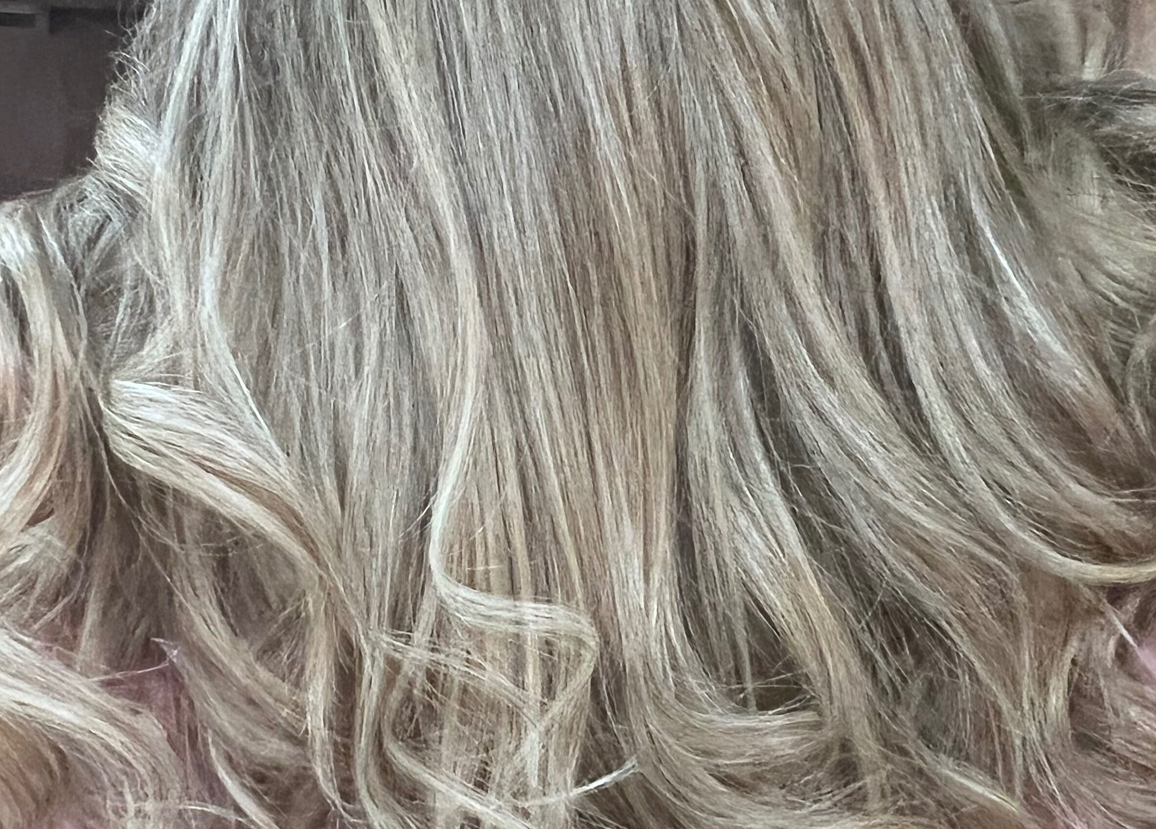 Close-up of styled blonde curls at Hair by Giovany, Puerto Vallarta, Jalisco, MX.