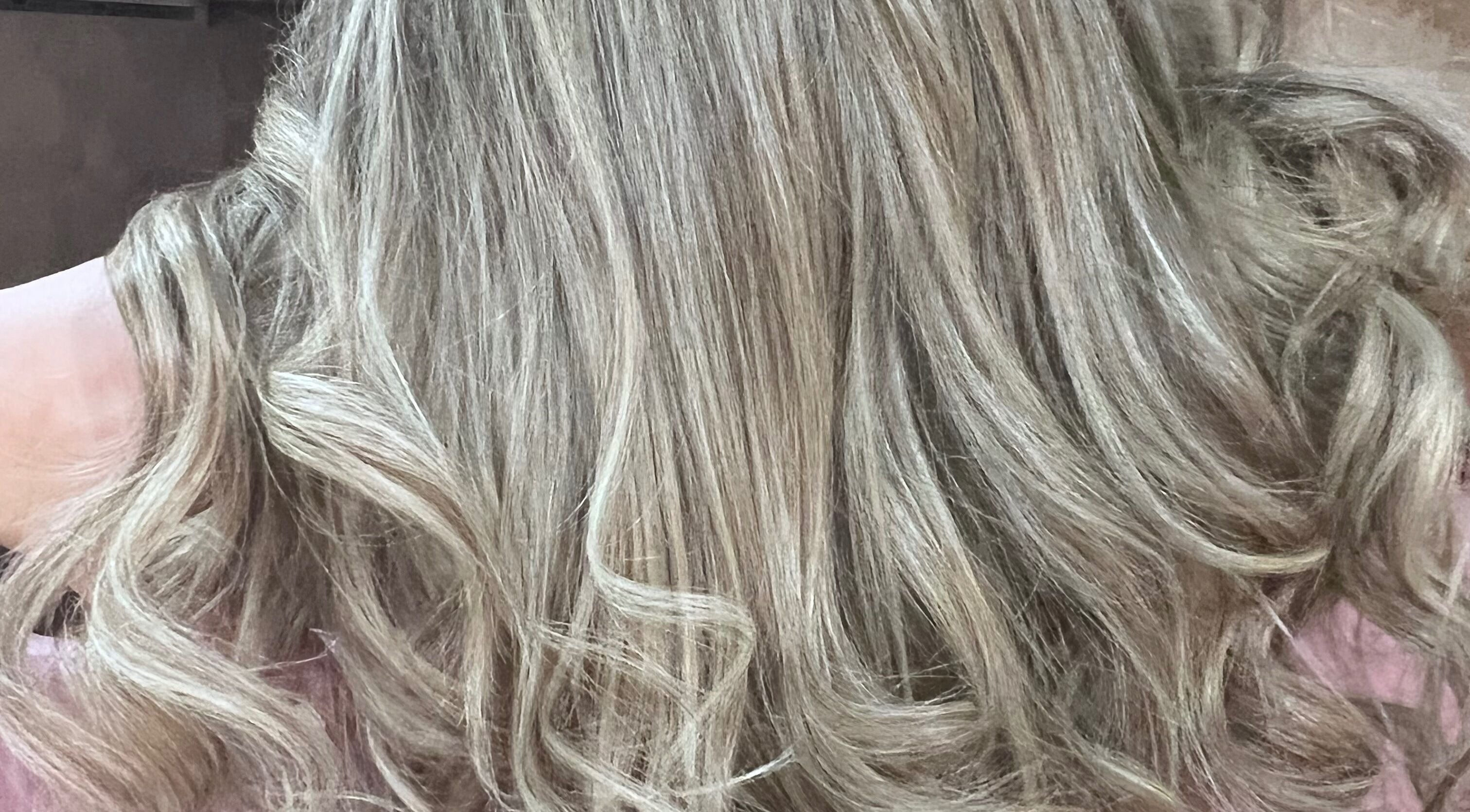 Close-up of styled blonde curls at Hair by Giovany, Puerto Vallarta, Jalisco, MX.