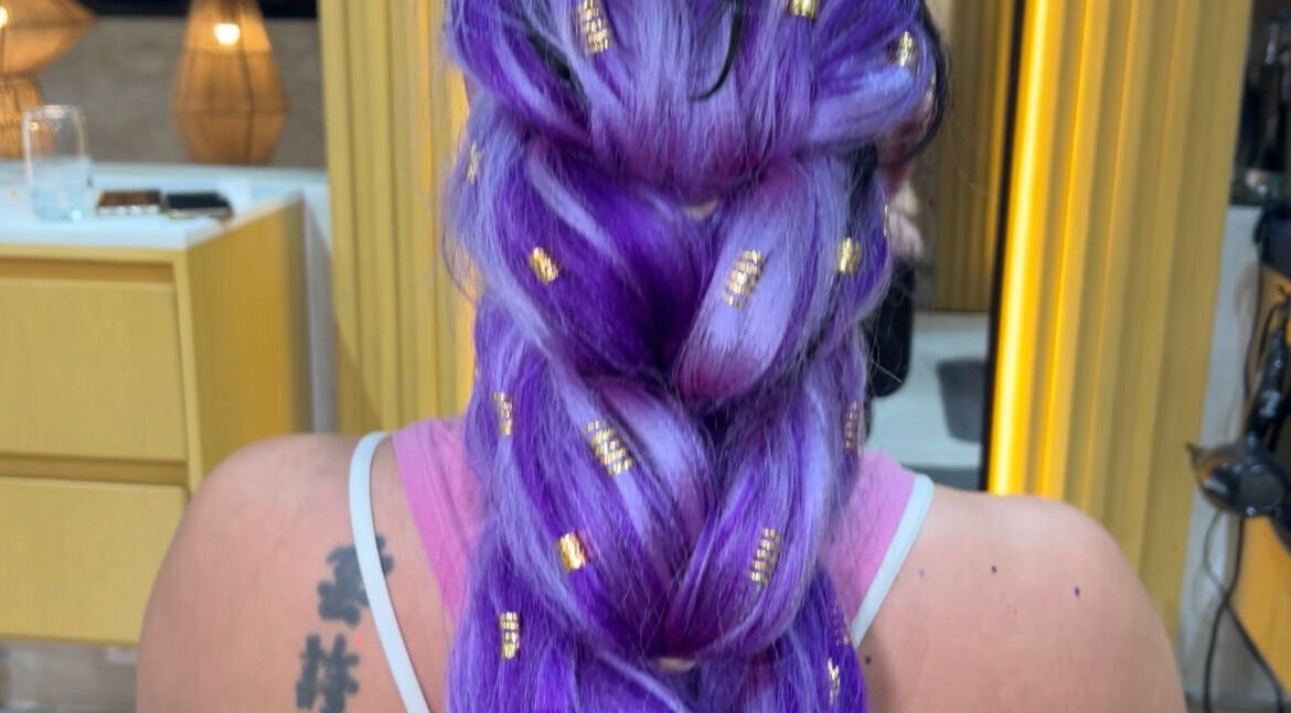 Intricate violet braid with gold accents at Hair by Giovany in Puerto Vallarta, Jalisco, MX.