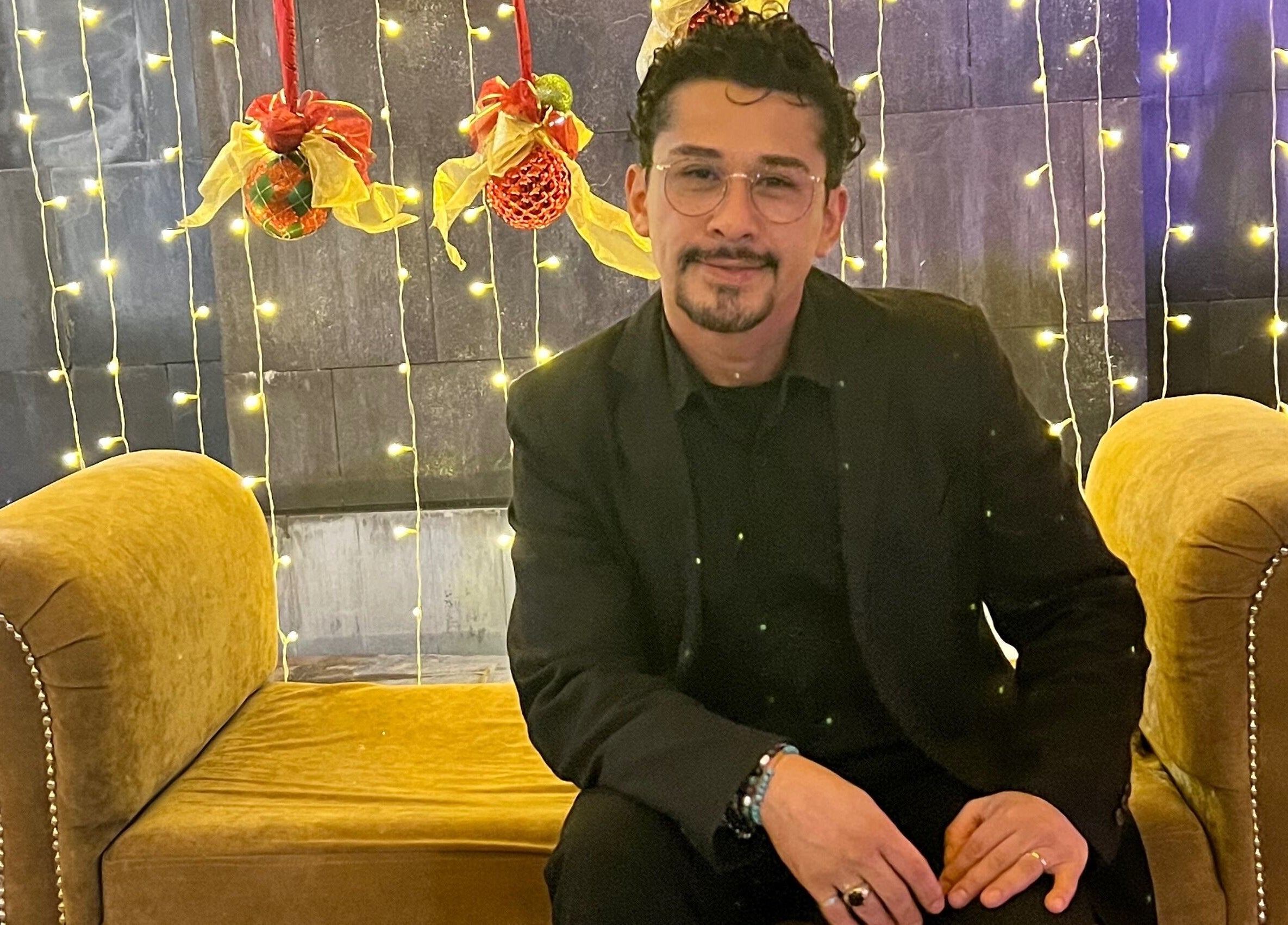 Elegant seating at Hair by Giovany with festive decor in Puerto Vallarta, Jalisco, MX.