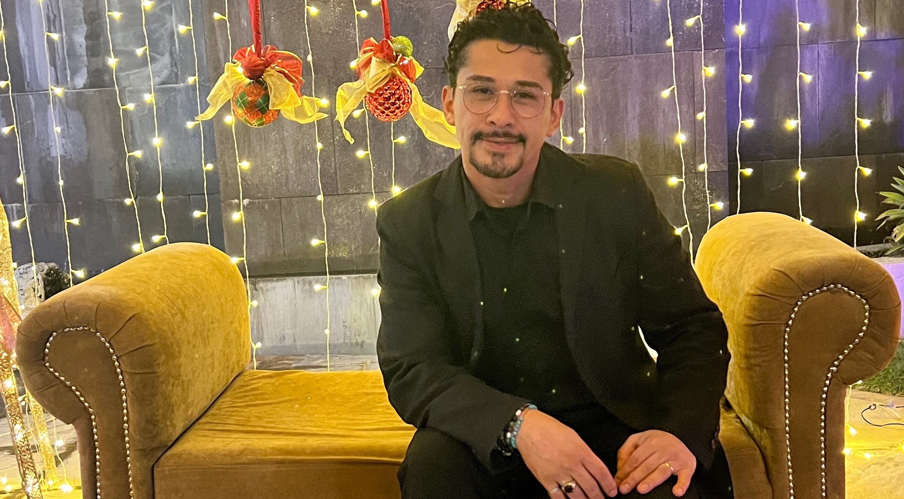 Elegant seating at Hair by Giovany with festive decor in Puerto Vallarta, Jalisco, MX.