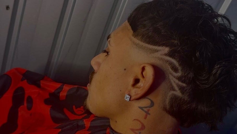 Intricate fade haircut design at SWAG DA BARBER, Melbourne, Victoria, AU. Modern style and precision.