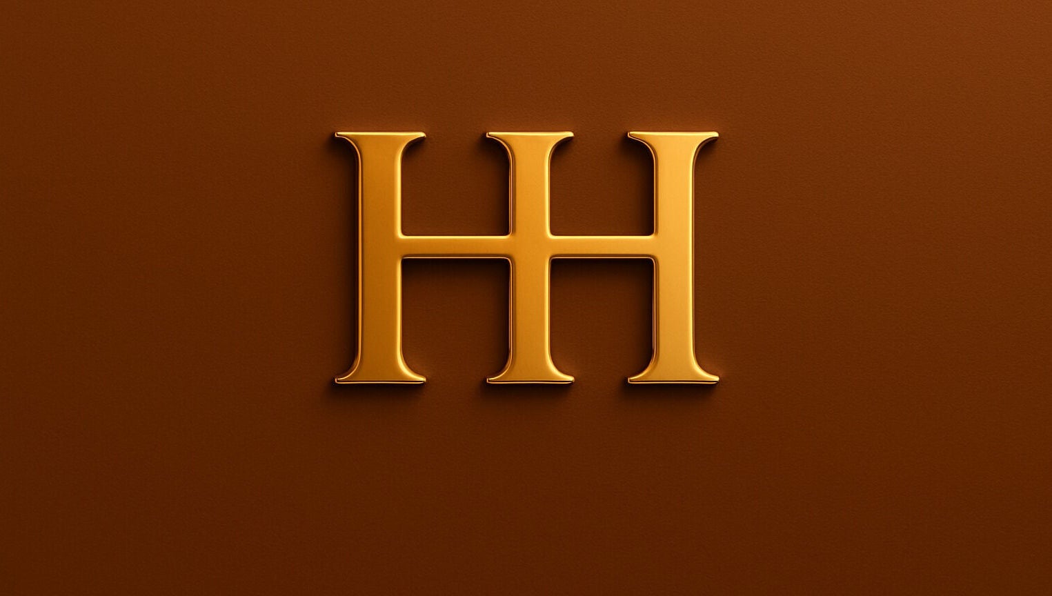 Golden HH emblem representing HH Permanent Makeup in Glendale, California, US on a rich brown background.