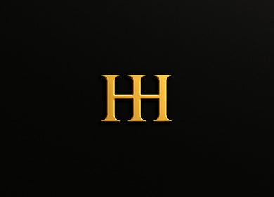 Gold HH emblem for HH Permanent Makeup in Glendale, California, US on black background.