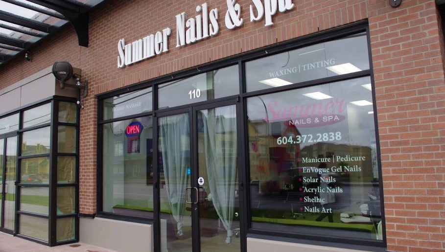 Exterior of Summer nail & spa in Surrey, British Columbia, CA, showcasing modern glass facade.