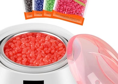 Colorful wax beads at Rapha Wellness, Johannesburg, Gauteng, ZA, perfect for smooth skin treatments.