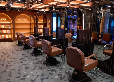 Stylish interior of Hair The Beau Myeongdong salon located in 서울특별시, 서울특별시, KR with elegant seating.