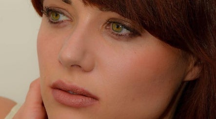 Close-up of a woman's face highlighting smooth skin at Elevated Beauty by Erica, Bourne, Massachusetts, US.