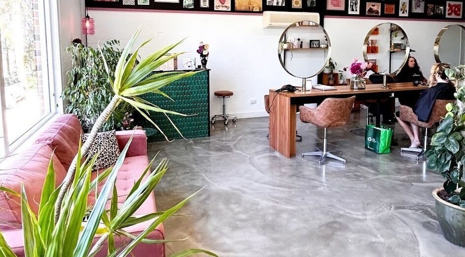 Look at Me now Hairbychelsea salon interior in Forster, New South Wales, AU. Cozy chairs and stylish decor.