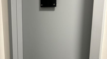 Entrance door to Microblading by Kimberley in Rosyth, Scotland, GB, showcasing a sleek, modern design.