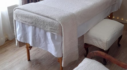 Elegant massage table at Black Excellence Massage Studio, Pretoria, Gauteng, ZA exudes relaxation.