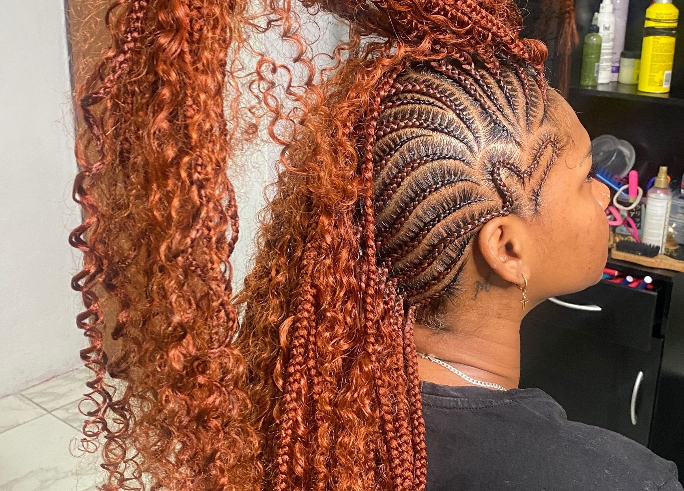 Intricate braids and curls at Goddess Strands, located in Philipsburg, [no Name], SX.