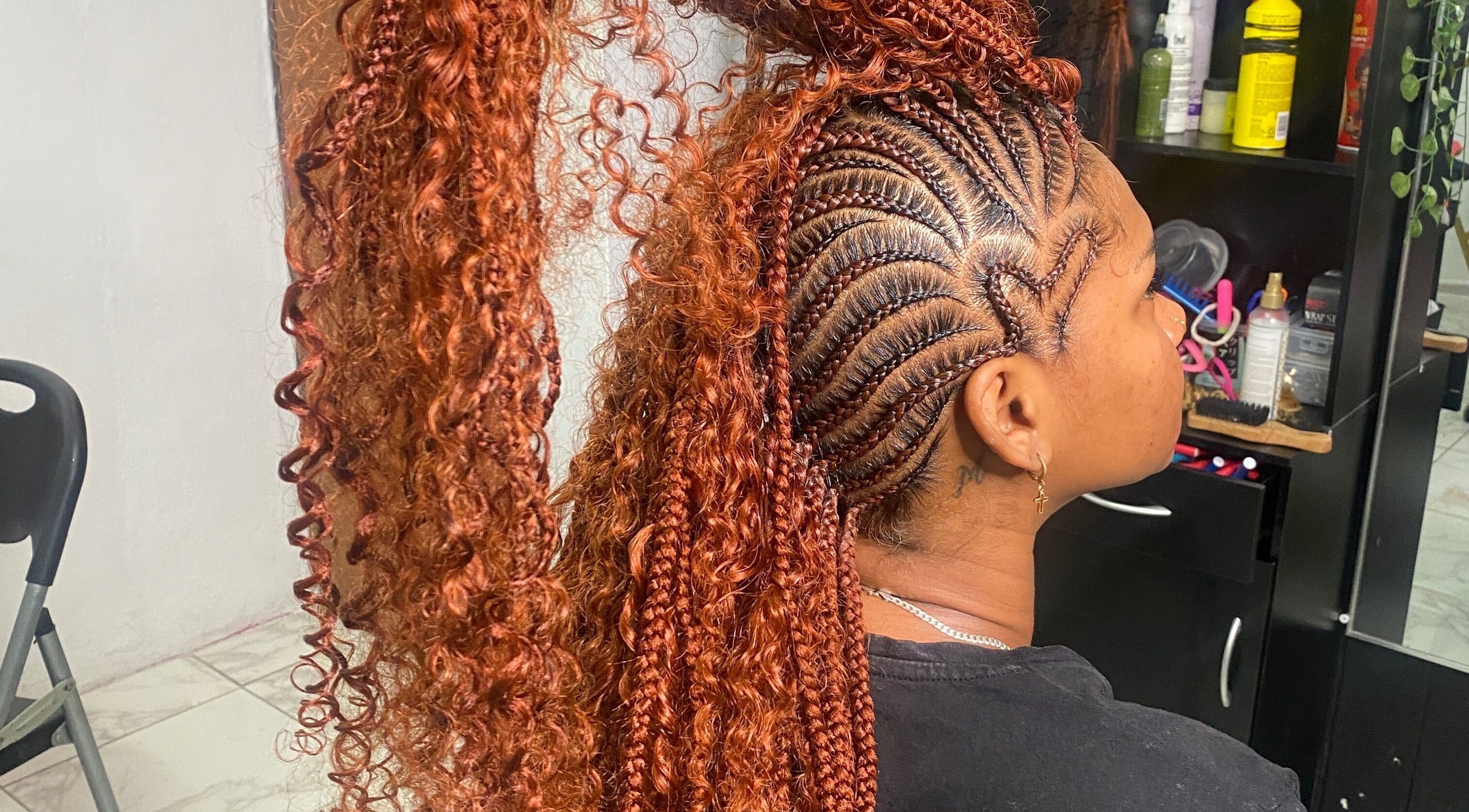 Intricate braids and curls at Goddess Strands, located in Philipsburg, [no Name], SX.
