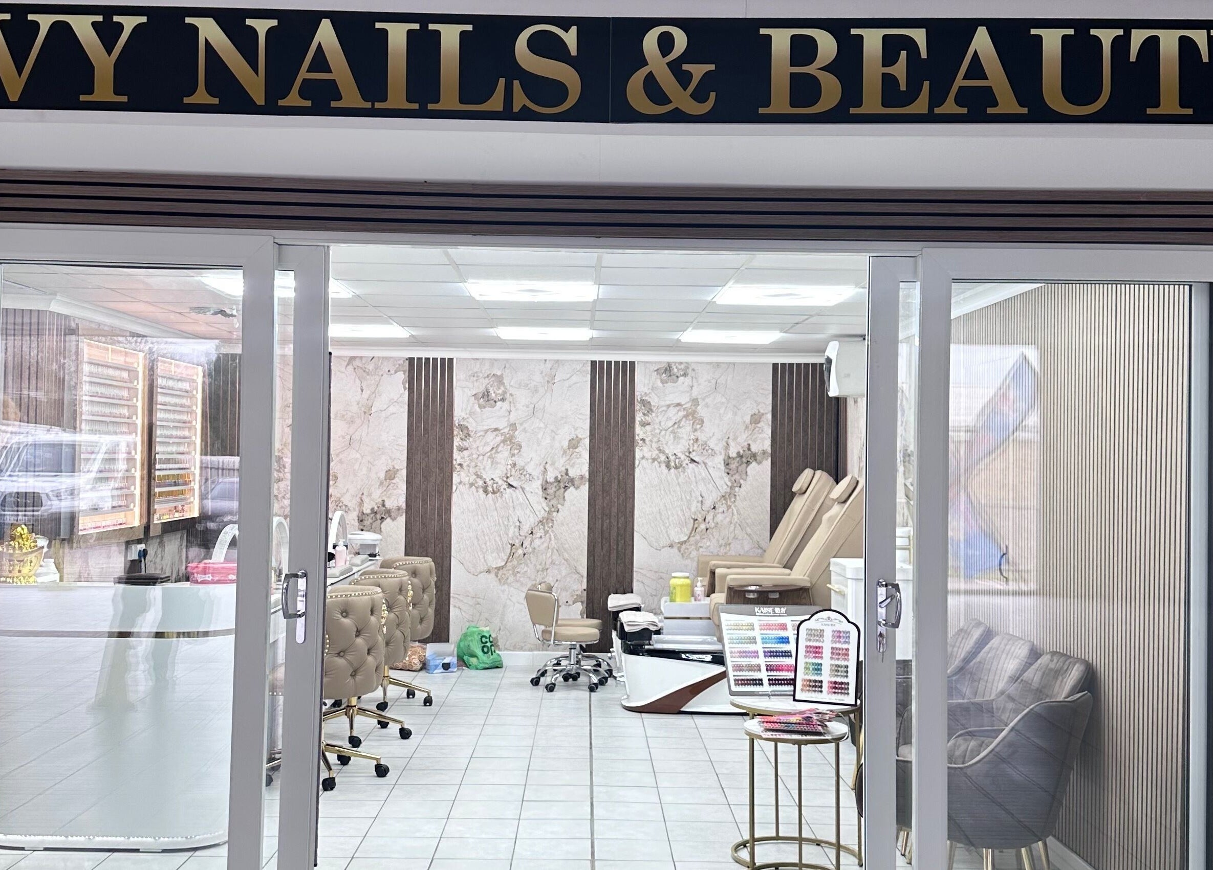 Front view of Ivy Nails and Beauty, a modern salon in Yeovil, England, GB, showcasing stylish interiors.
