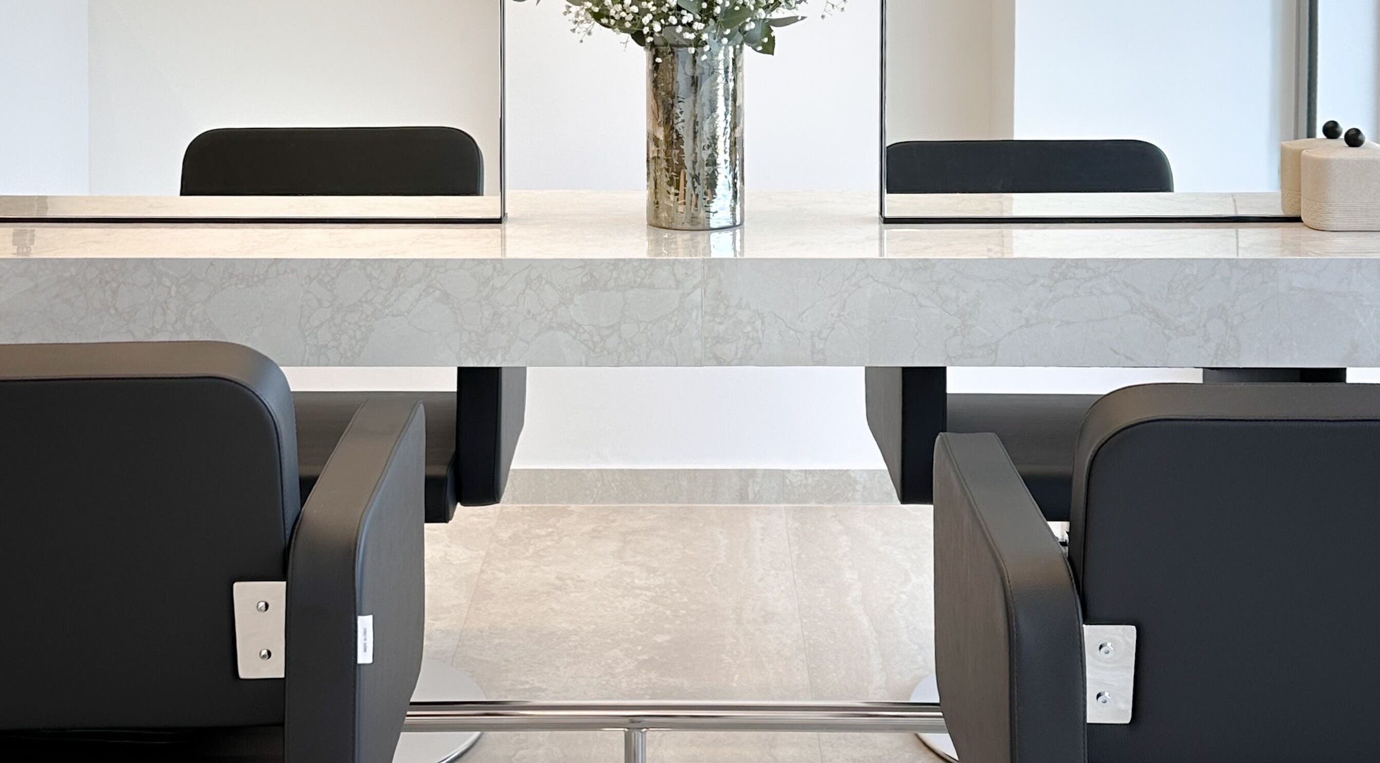 Modern styling station with chairs and mirror at Jo Hair & Beauty, Βούλα, GR.