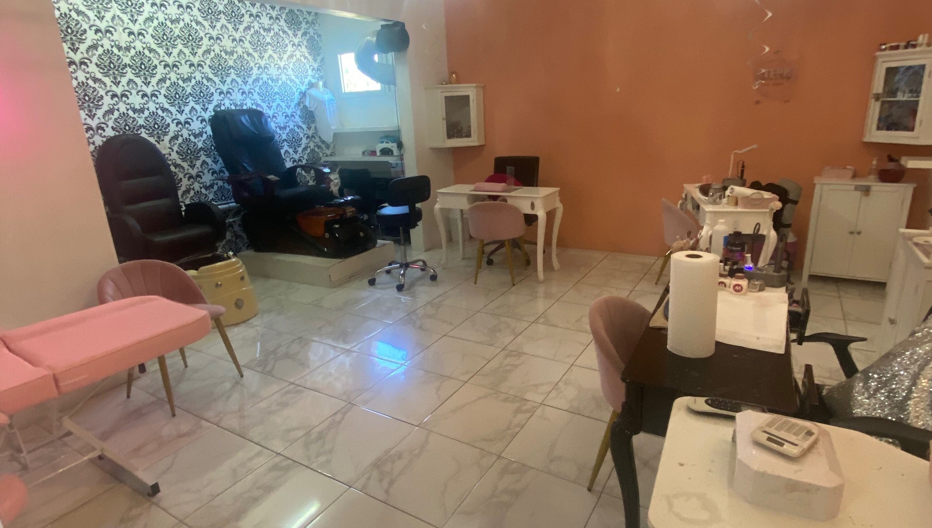 Elegant interior of Glam Room SXM in Philipsburg, [no Name], SX with chic decor and modern seating.