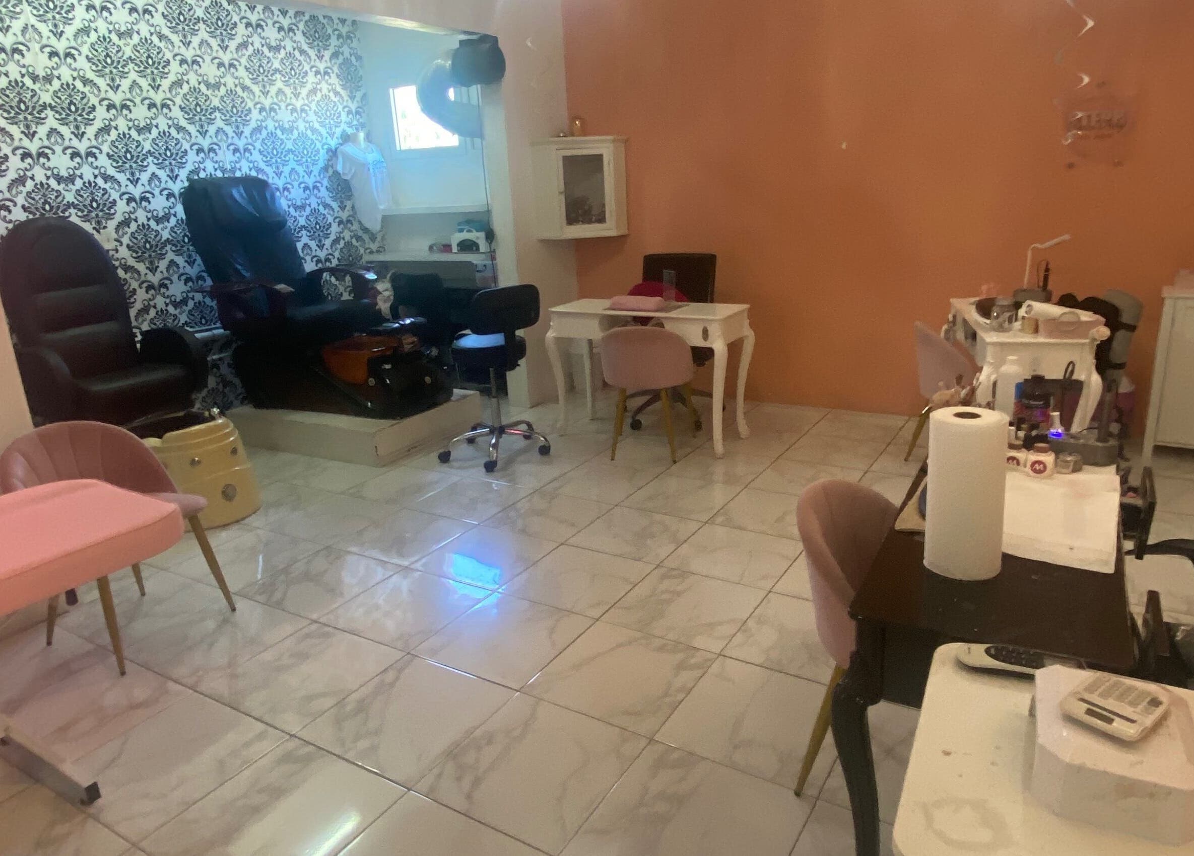 Elegant interior of Glam Room SXM in Philipsburg, [no Name], SX with chic decor and modern seating.