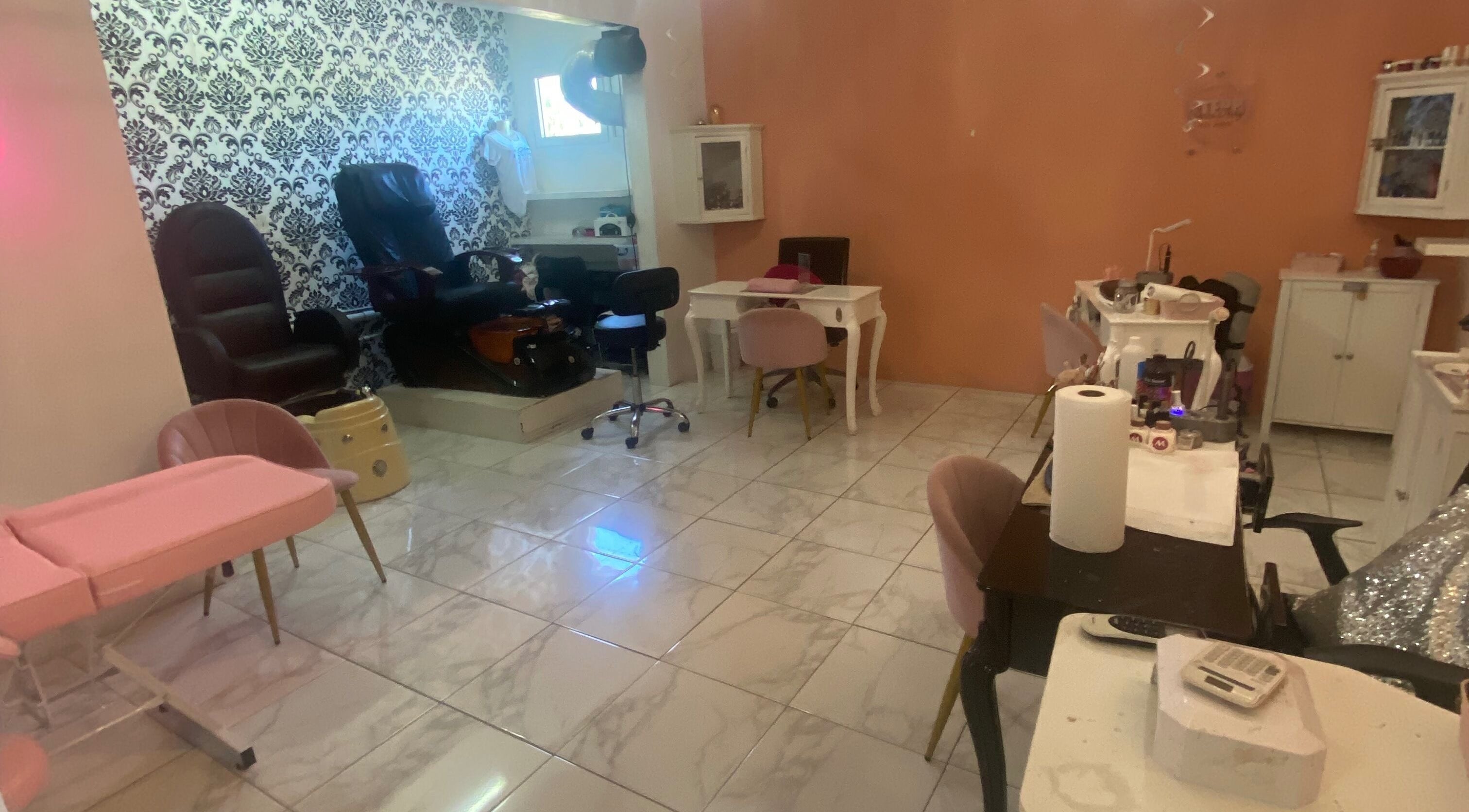 Elegant interior of Glam Room SXM in Philipsburg, [no Name], SX with chic decor and modern seating.