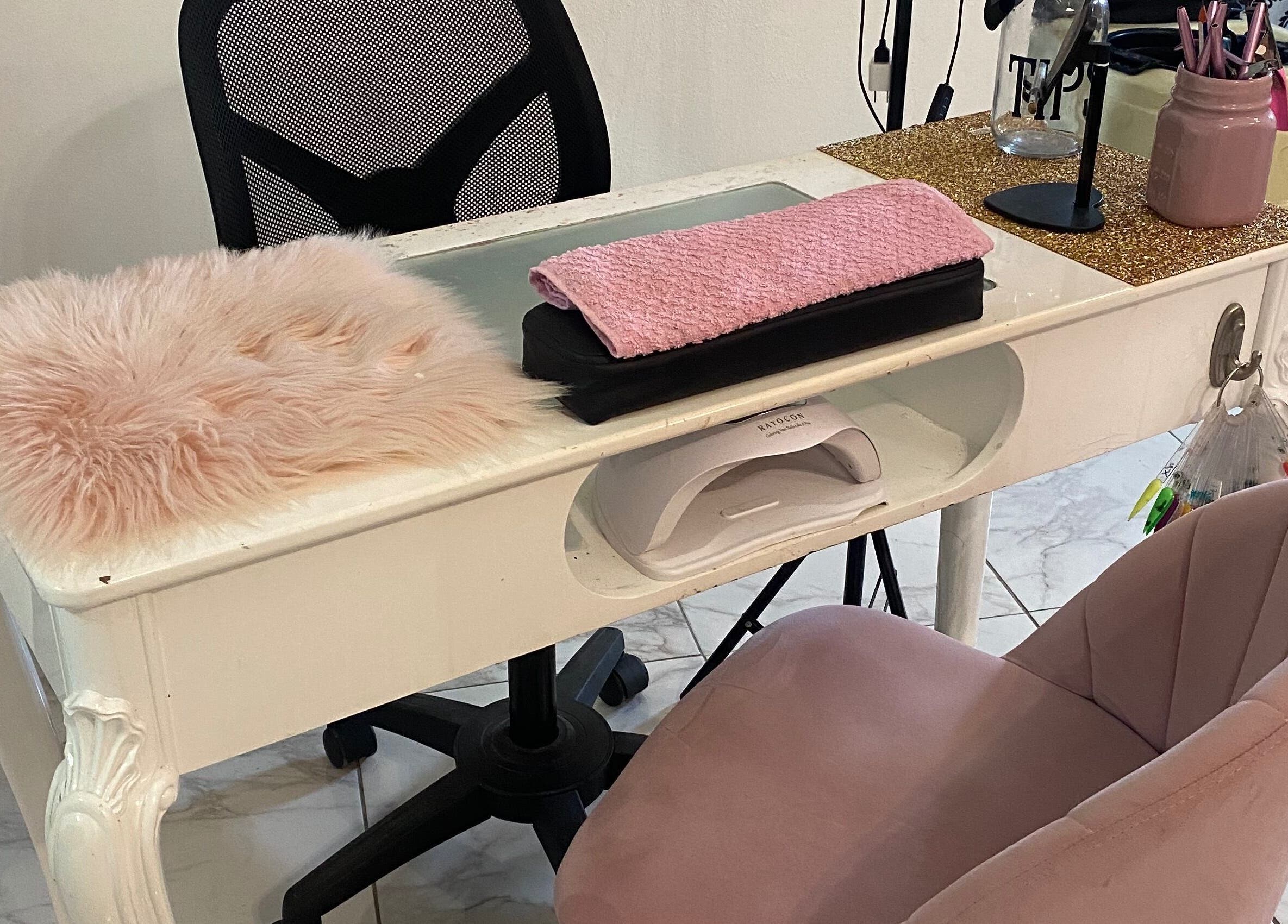 Elegant nail station at Glam Room SXM, Philipsburg, SX with plush pink decor and modern amenities.