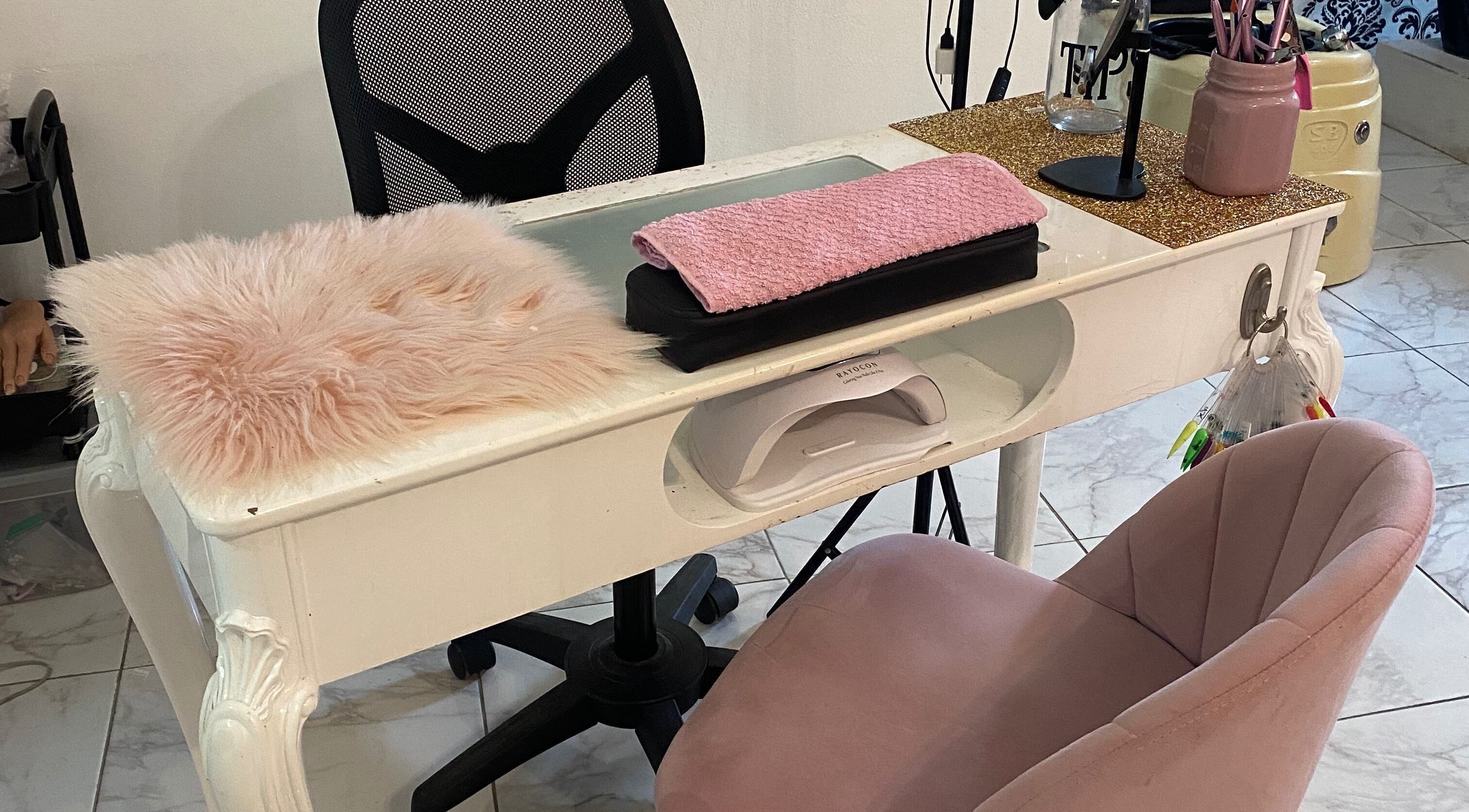 Elegant nail station at Glam Room SXM, Philipsburg, SX with plush pink decor and modern amenities.