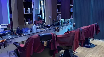 Interior of Irbil Barbers & Amani 6- Hairdresser in Bradford, England, GB, featuring modern barber chairs and equipment.