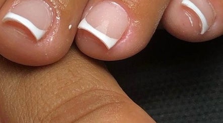 French pedicure at Happy Feet & Nails in Willemstad, Curaçao, CW showcasing perfectly manicured toes.