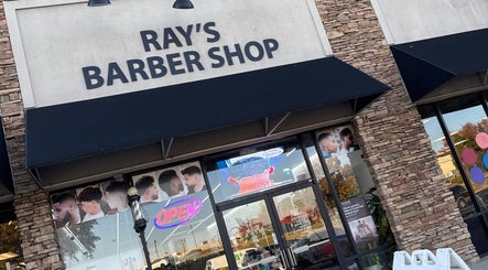 Entrance of Ray’s Dominican Barbershop in Roswell, Georgia, US with a modern design and welcoming vibe.