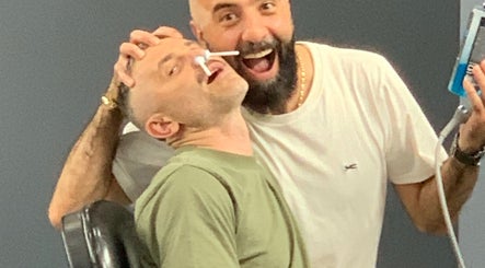 Happy customer at Barber Manch LA enjoying service in Glendale, California, US.