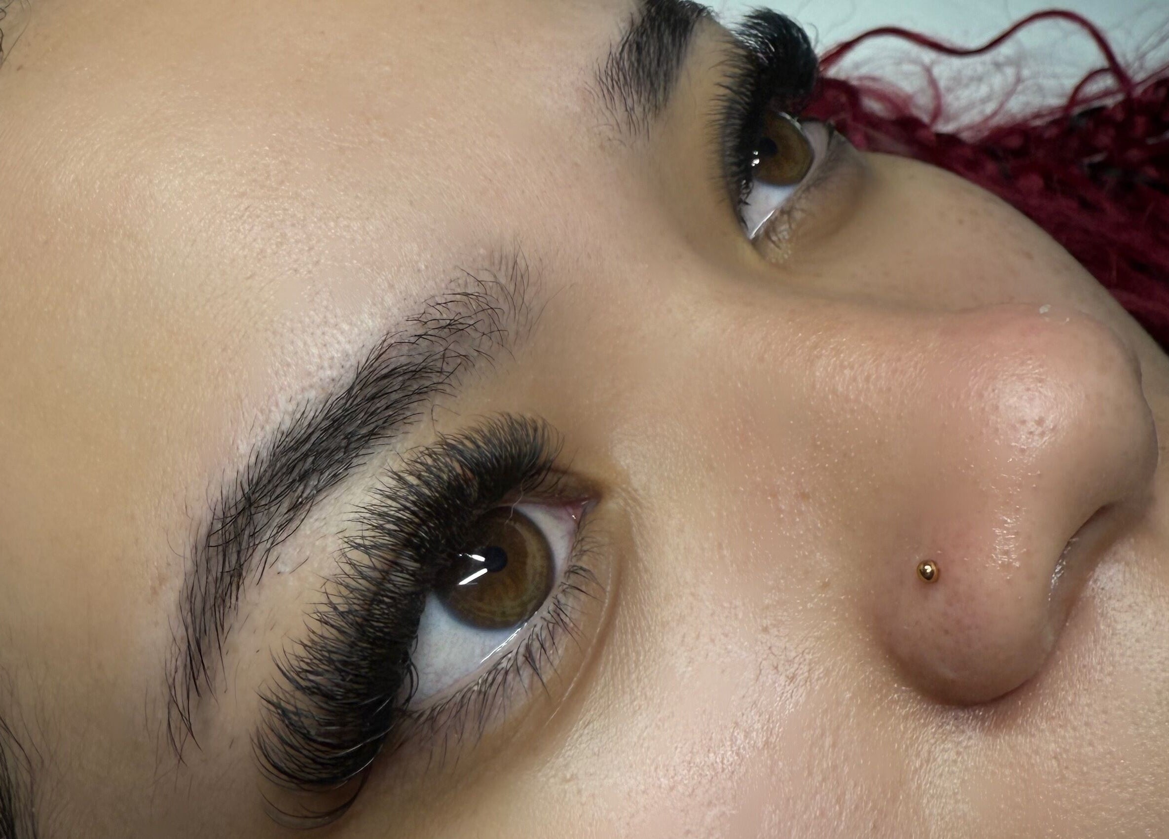 Close-up of expertly applied eyelash extensions at Rayas.Beautybar in Beenleigh, Queensland, AU.