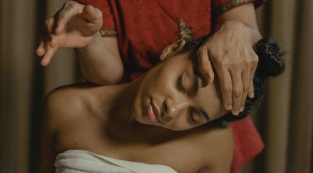 Woman enjoying a head massage at LV Massage & Spa in Fort Worth, Texas, US, showcasing relaxation and wellness.