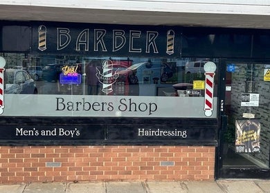 The Gentlemens Room Classic Barbers, located in Exmouth, England, offers stylish men's grooming in a classic barbershop setting.