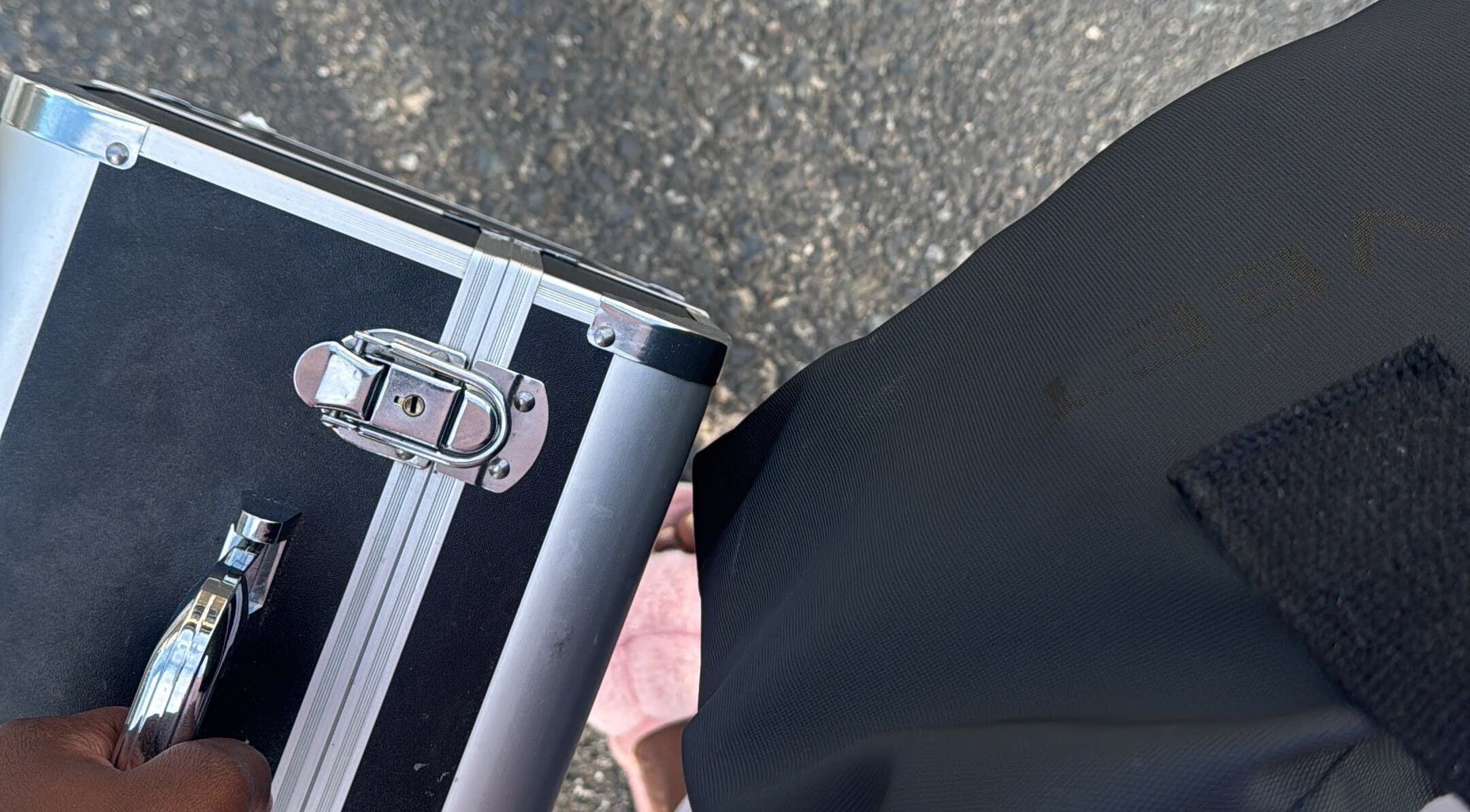 Carrying a chic nail kit outside Opulent Nails in Cape Town, Western Cape, ZA.