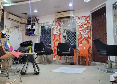 Bright and colorful salon interior at Atino beauty place, Lekki, Lagos, NG with modern chairs and decor.