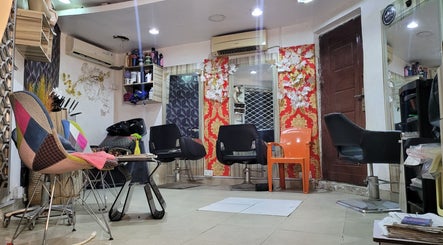 Bright and colorful salon interior at Atino beauty place, Lekki, Lagos, NG with modern chairs and decor.