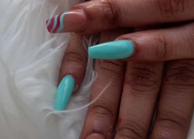 Stylish turquoise manicure with swirl design at Nailzxnicey, Saint Thomas, Saint Thomas, BB.