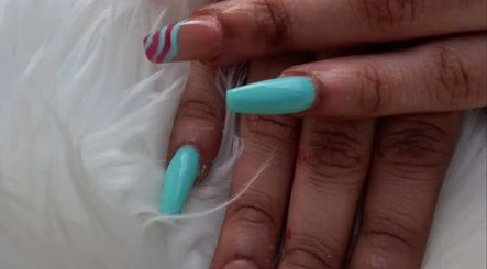 Stylish turquoise manicure with swirl design at Nailzxnicey, Saint Thomas, Saint Thomas, BB.