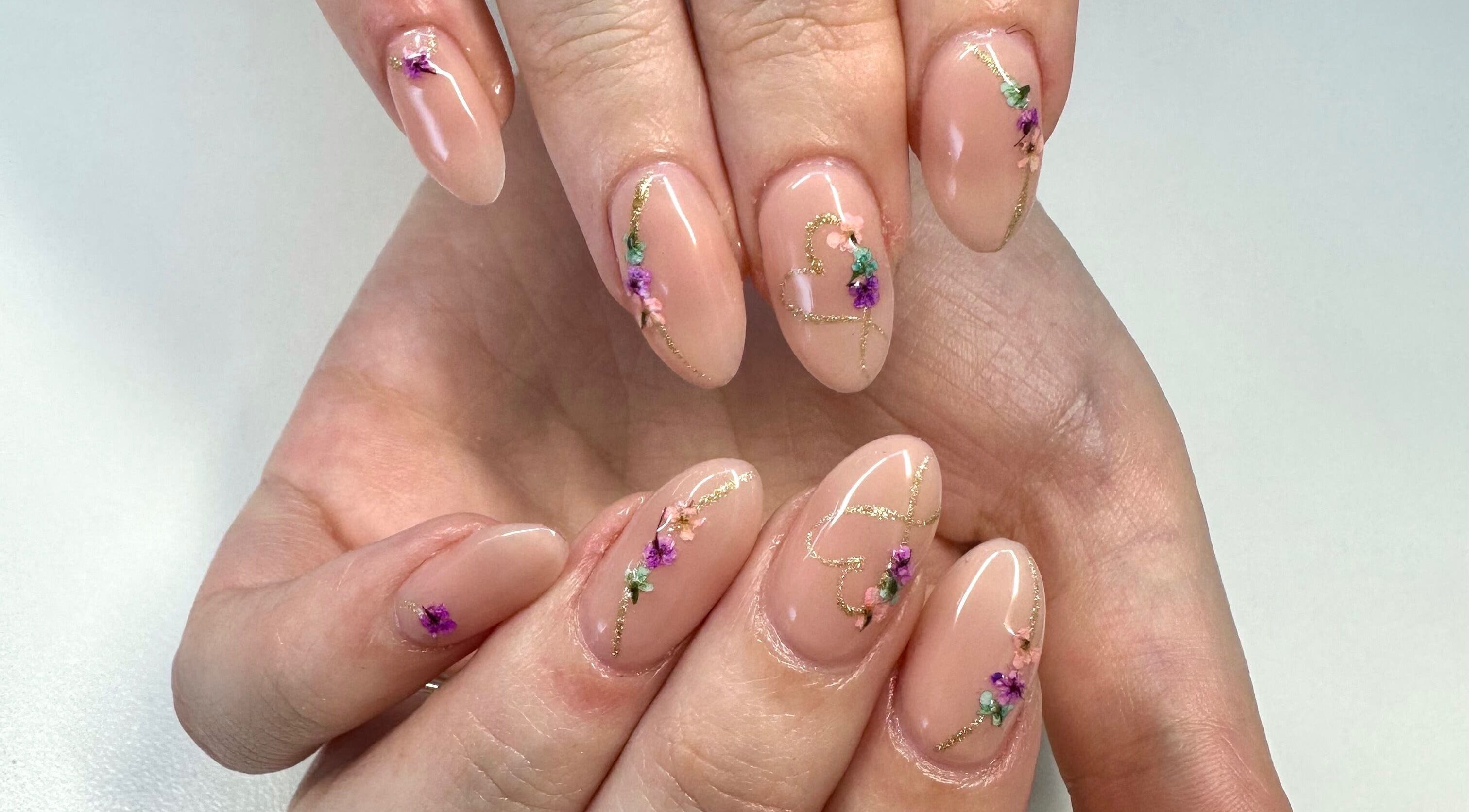 Intricate floral nail art at LuBella Beauty, Waterfall, Kwazulu-natal, ZA showcasing detailed craftsmanship.