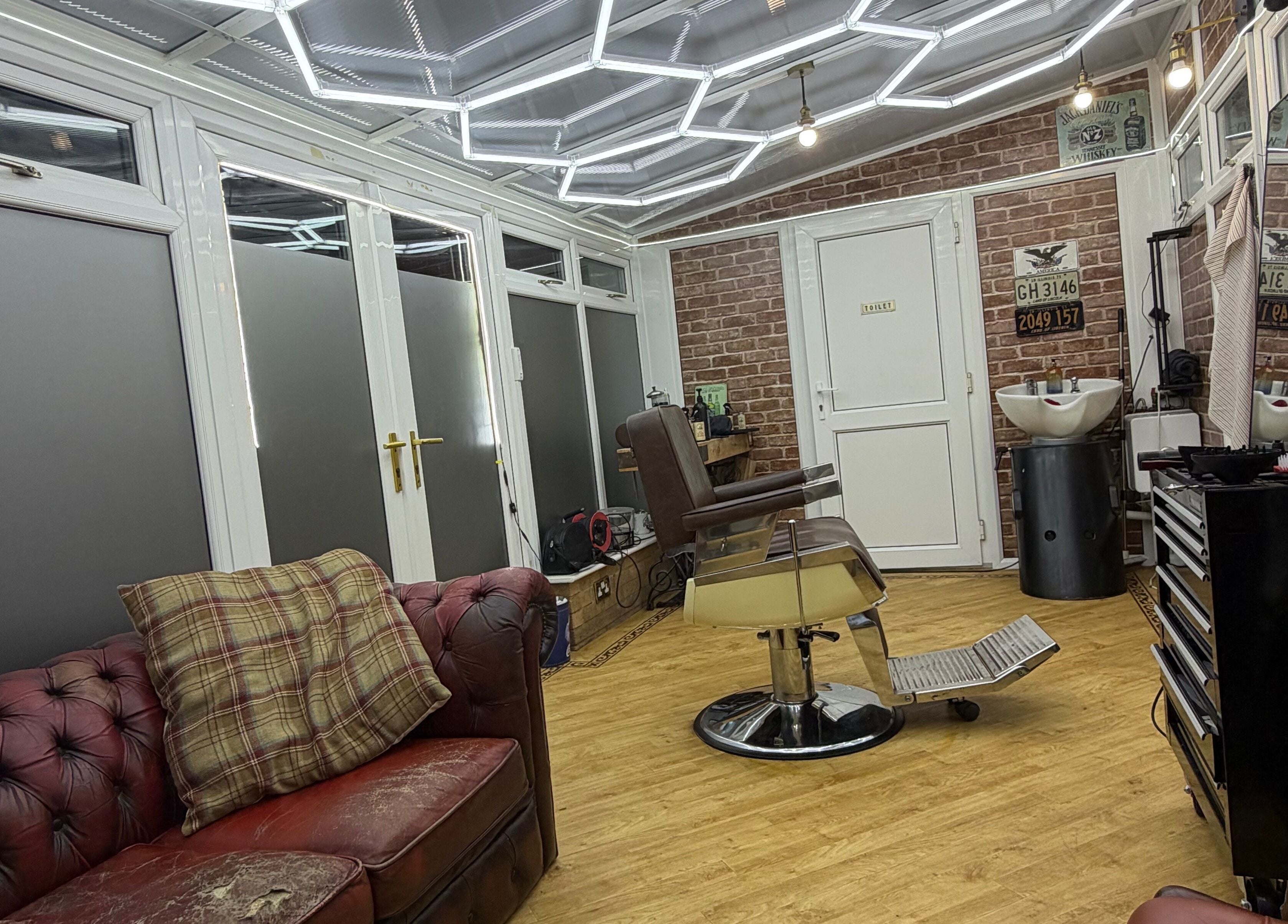 No45 Bespoke Barbering in Emneth, England, showcases a classic barber chair and stylish interior.