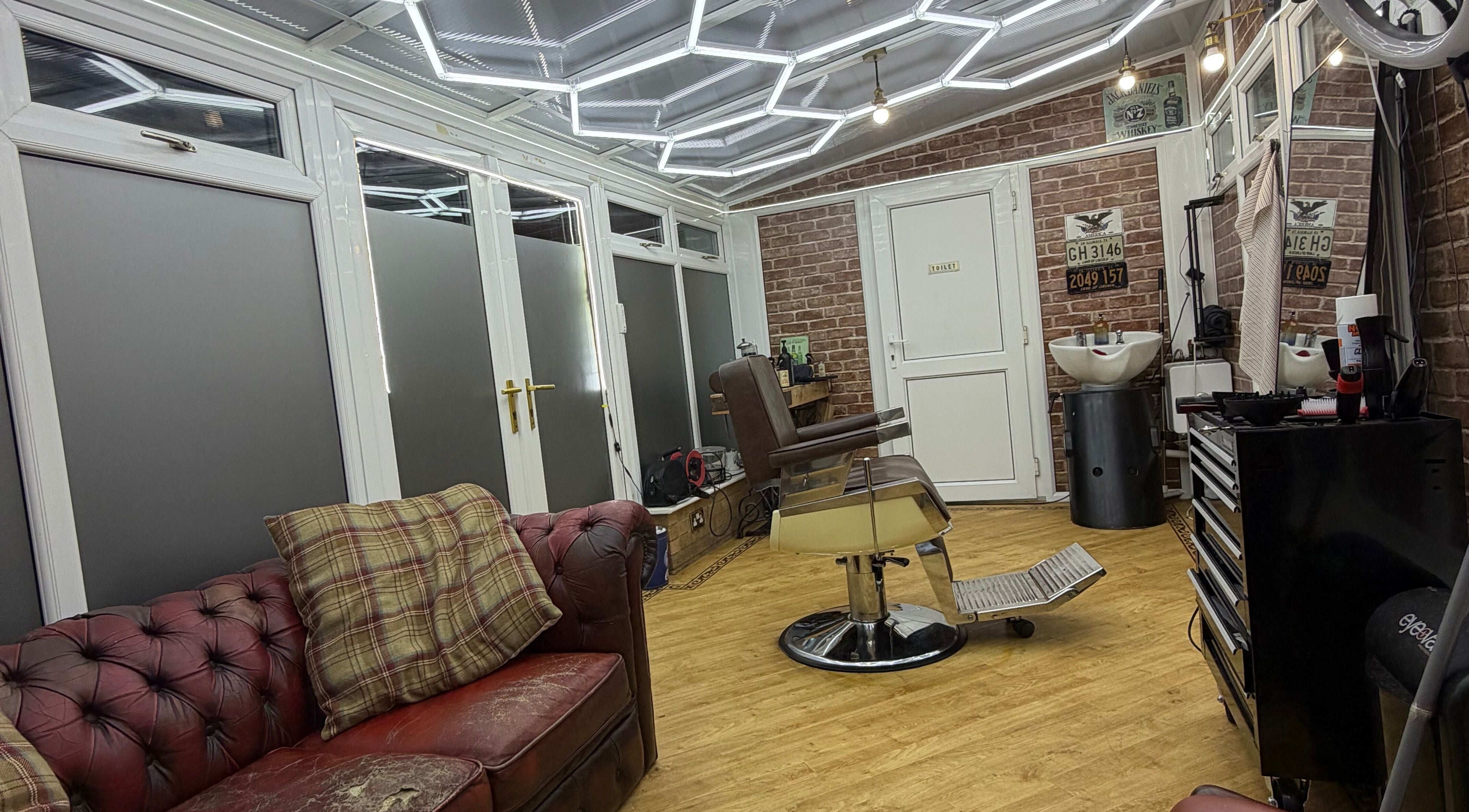 No45 Bespoke Barbering in Emneth, England, showcases a classic barber chair and stylish interior.