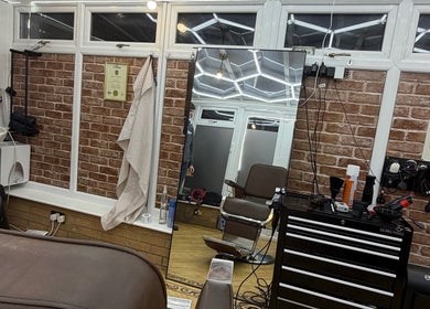 Interior of No45 Bespoke Barbering in Emneth, England, GB with vintage barber chair and modern tools.