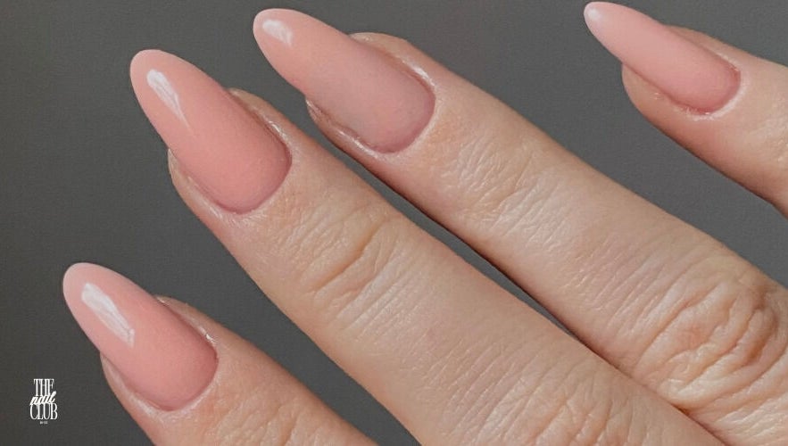 Close-up of elegant pink nails at The Nail Club By Ez, Newport, Wales, GB. Perfect manicure execution.
