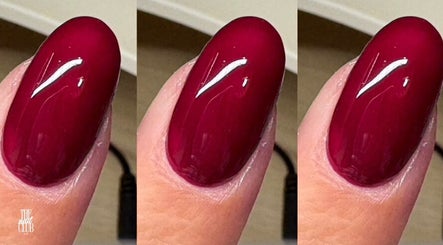 Elegant crimson nails at The Nail Club By Ez, Newport, Wales, GB, showcasing expert manicure technique.