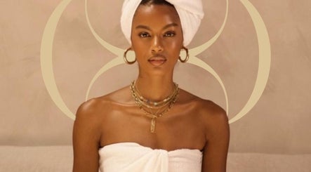 Relaxing spa experience at Ç-Spa: Beauty & Wellness, Willemstad, Curaçao, BQ with towel wrap and calm ambiance.