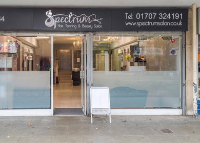 Spectrum Hair, Tanning & Beauty Salon entrance in Welwyn Garden City, England, GB showcasing a stylish facade.